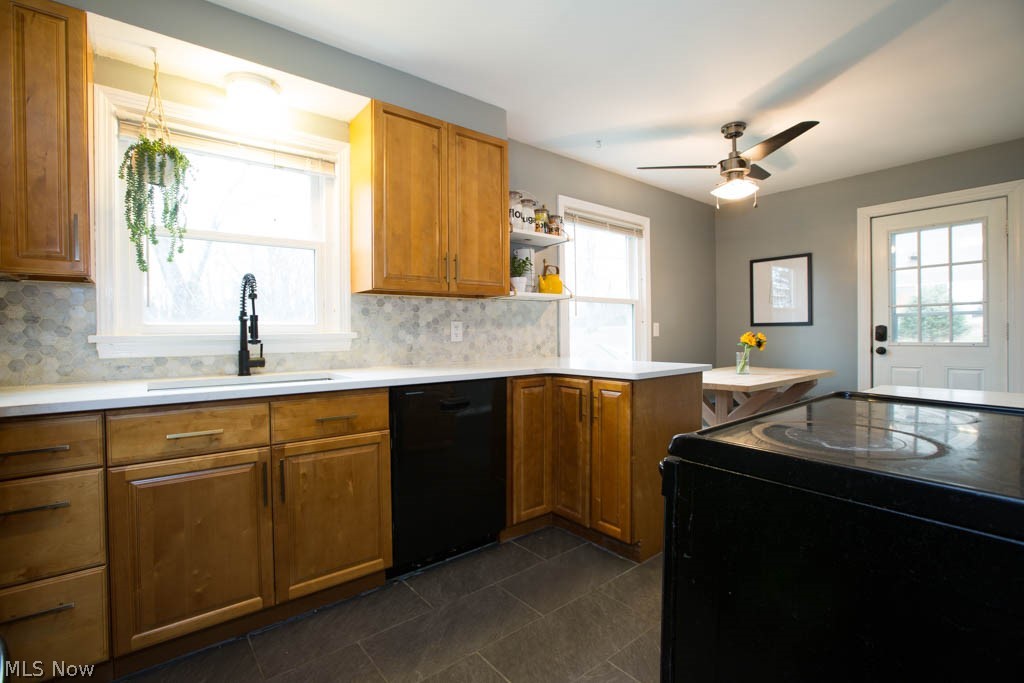 36000 Bainbridge Road Solon, OH 44139 - Photo 2 of 28 Beautifully updated kitchen with upgraded cabinets, quartz countertops, backsplash, ceramic floor