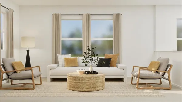 a living room with furniture and a chandelier