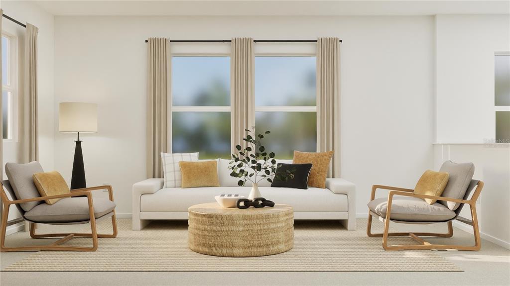 5629 Banyan Bay Road St. Cloud, FL 34771 - Photo 11 of 35 a living room with furniture and a chandelier