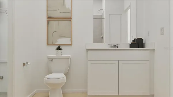 a bathroom with a sink and a toilet