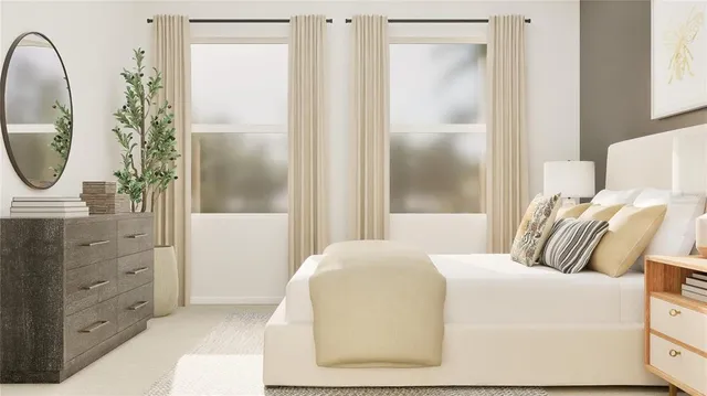 a bedroom with a bed and a mirror