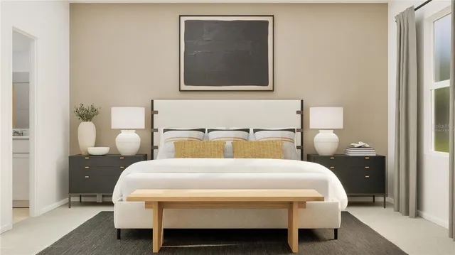 a bedroom with a bed and a table