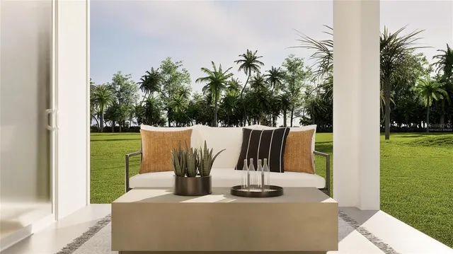 a view of a dining table and chairs in the garden