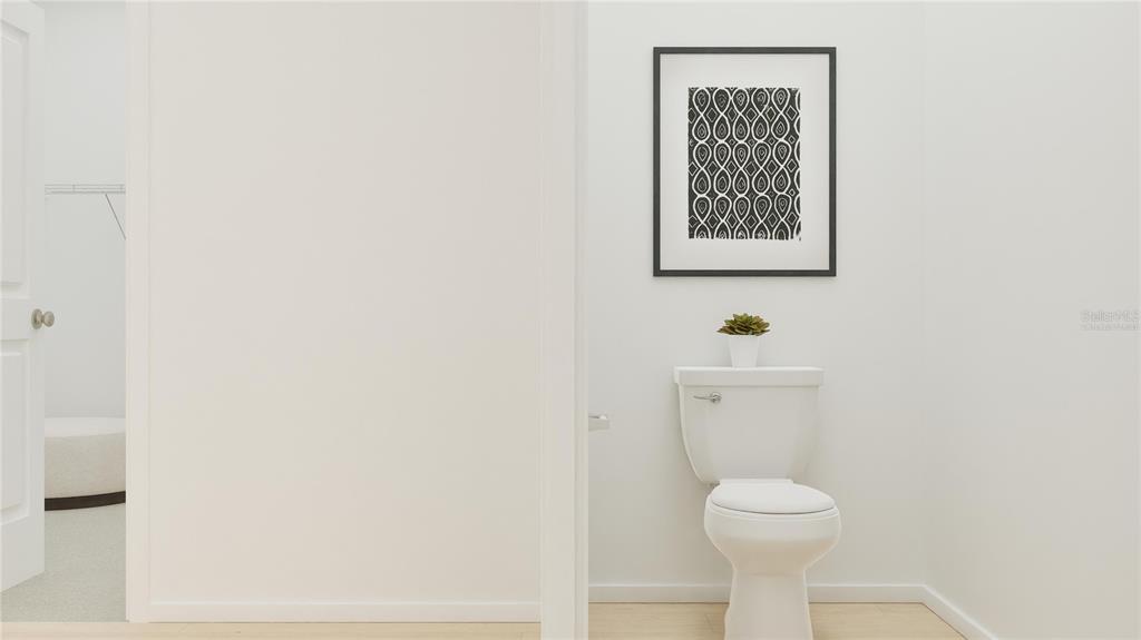 5629 Banyan Bay Road St. Cloud, FL 34771 - Photo 29 of 35 a bathroom with a toilet and a sink