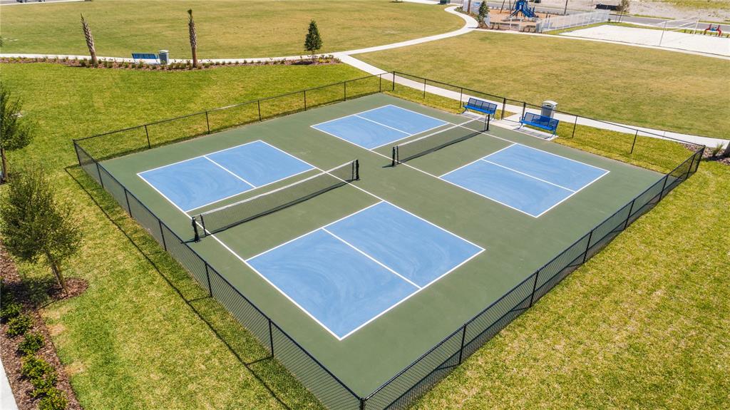 5629 Banyan Bay Road St. Cloud, FL 34771 - Photo 33 of 35 a blue swimming pool with lawn chairs