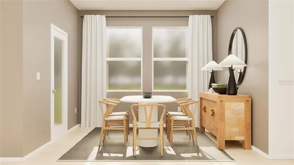 a dining room with furniture and a window