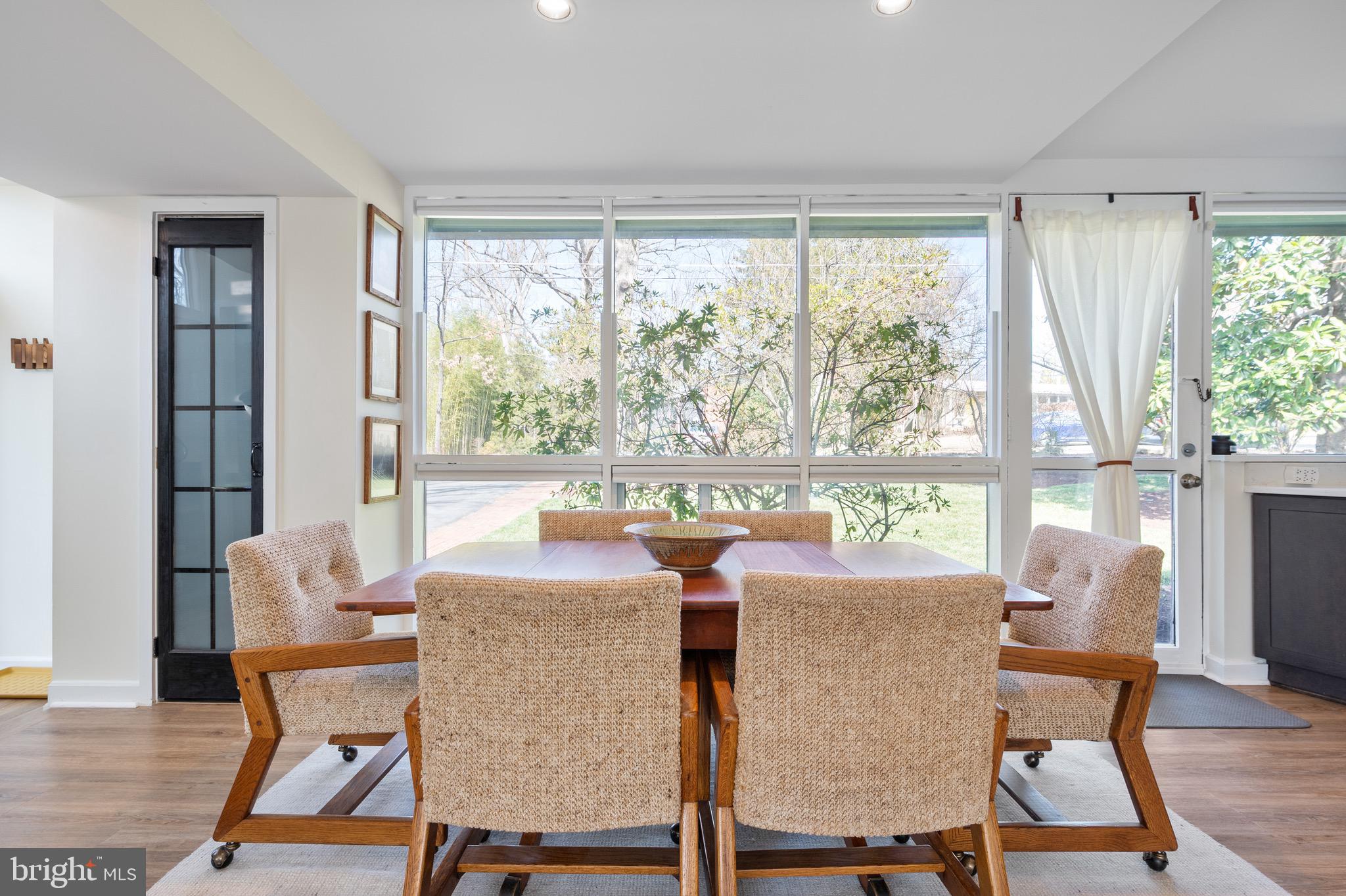 1945 Marthas Road Alexandria, VA 22307 - Photo 13 of 52 a dining room with furniture a large window and a table
