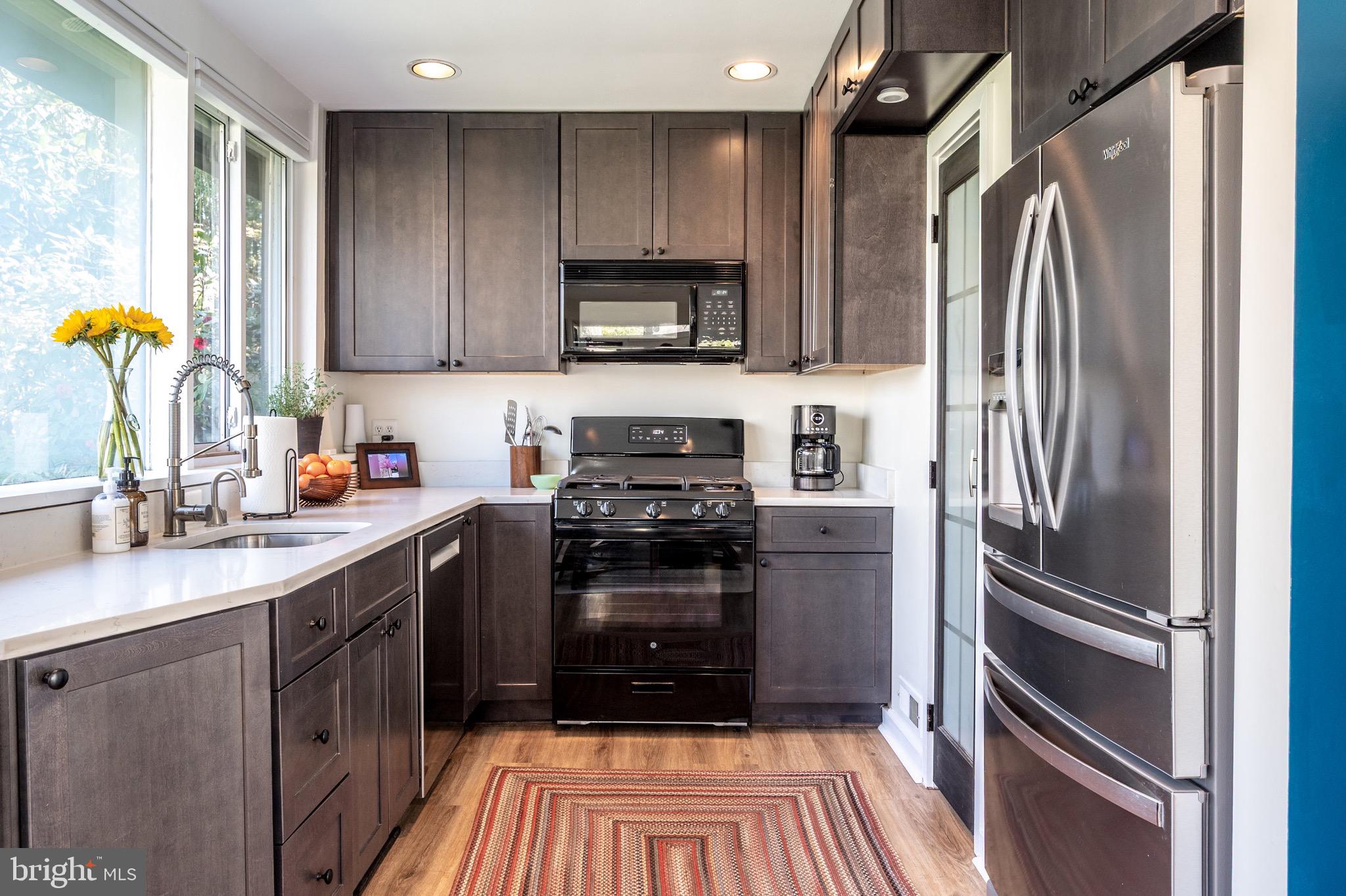 1945 Marthas Road Alexandria, VA 22307 - Photo 18 of 52 a kitchen with a refrigerator and a sink