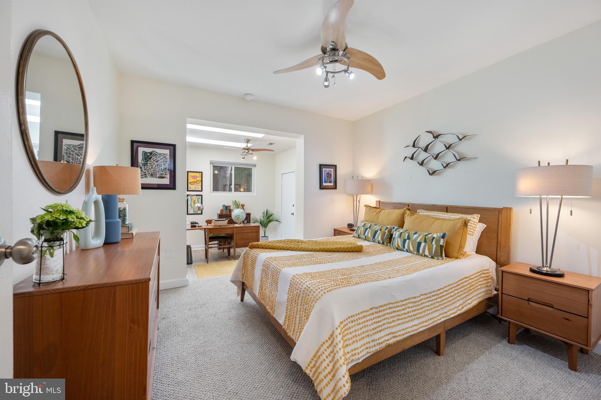 1945 Marthas Road Alexandria, VA 22307 - Photo 24 of 52 a bedroom with bed and a chandelier