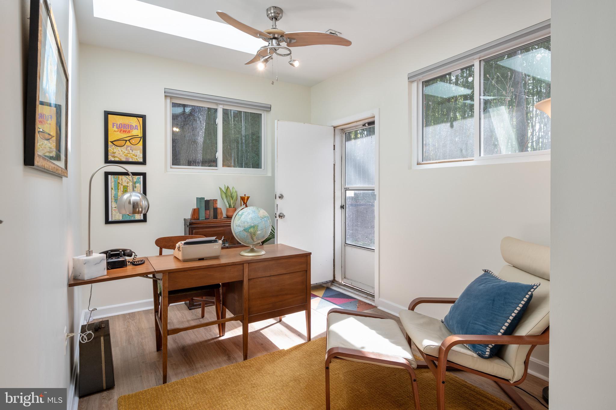 1945 Marthas Road Alexandria, VA 22307 - Photo 26 of 52 a view of a workspace with furniture and a window