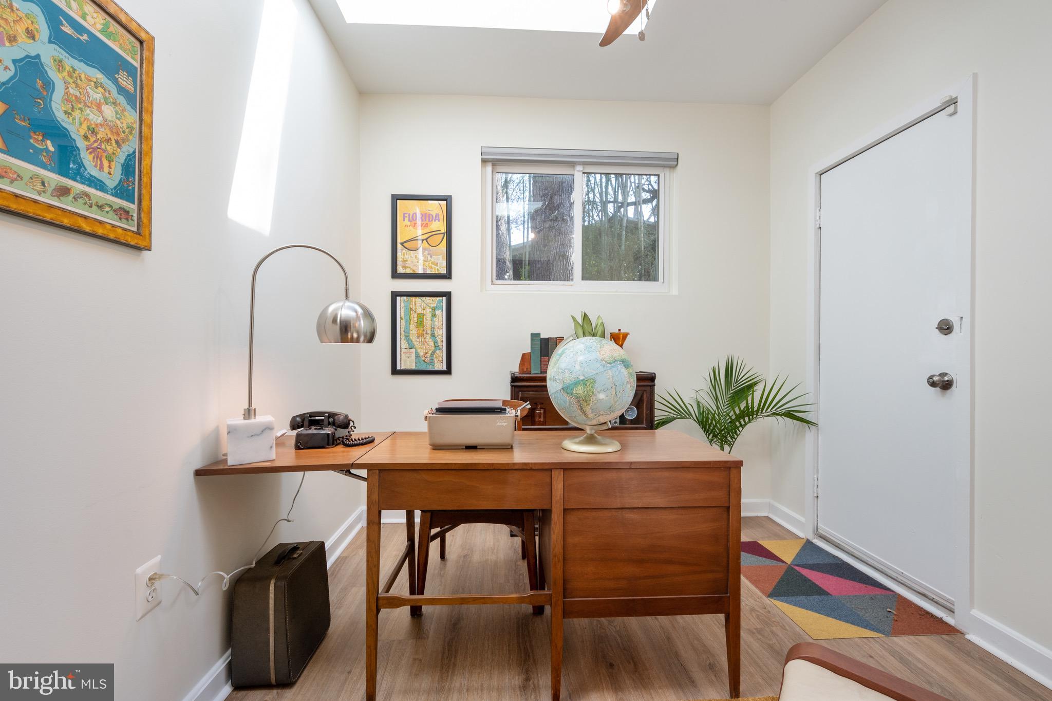 1945 Marthas Road Alexandria, VA 22307 - Photo 27 of 52 a view of a workspace with furniture and window