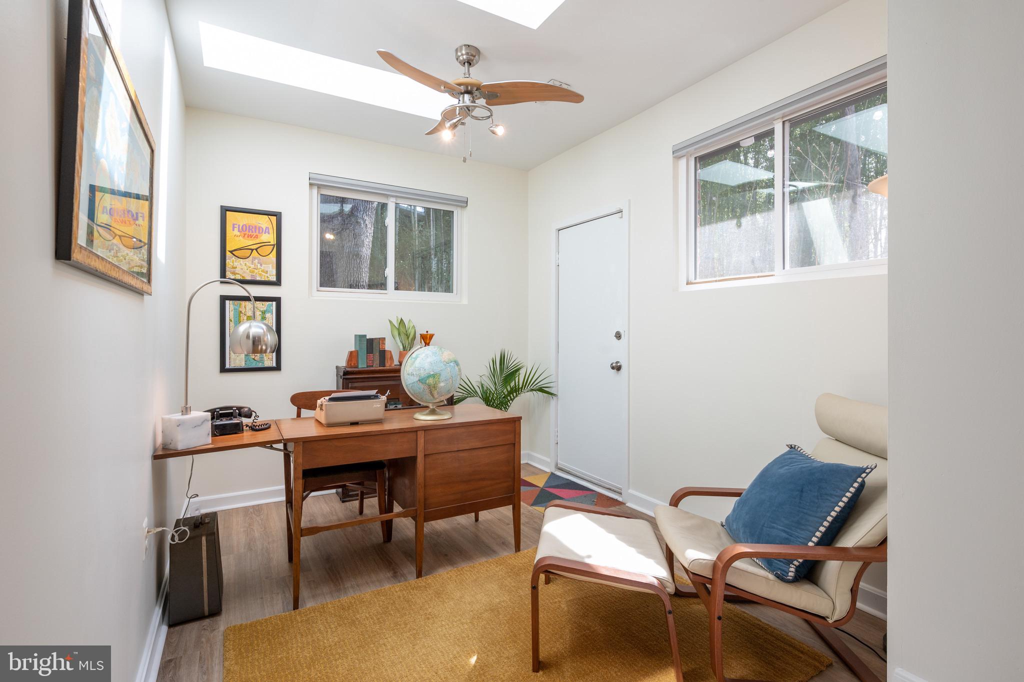 1945 Marthas Road Alexandria, VA 22307 - Photo 28 of 52 a view of a workspace with furniture window and wooden floor