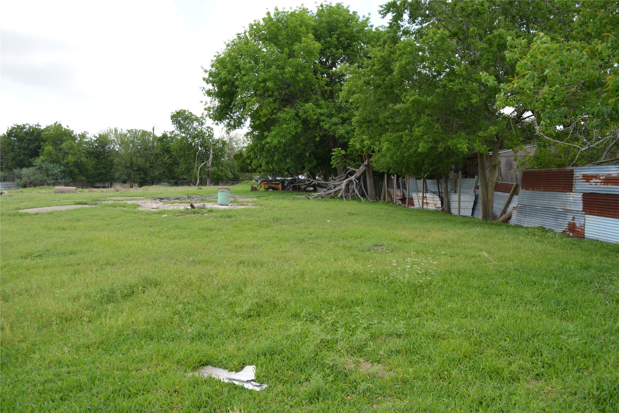 0 Reed Road Houston, TX 77033 - Photo 16 of 24 a backyard of a house with lots of green space