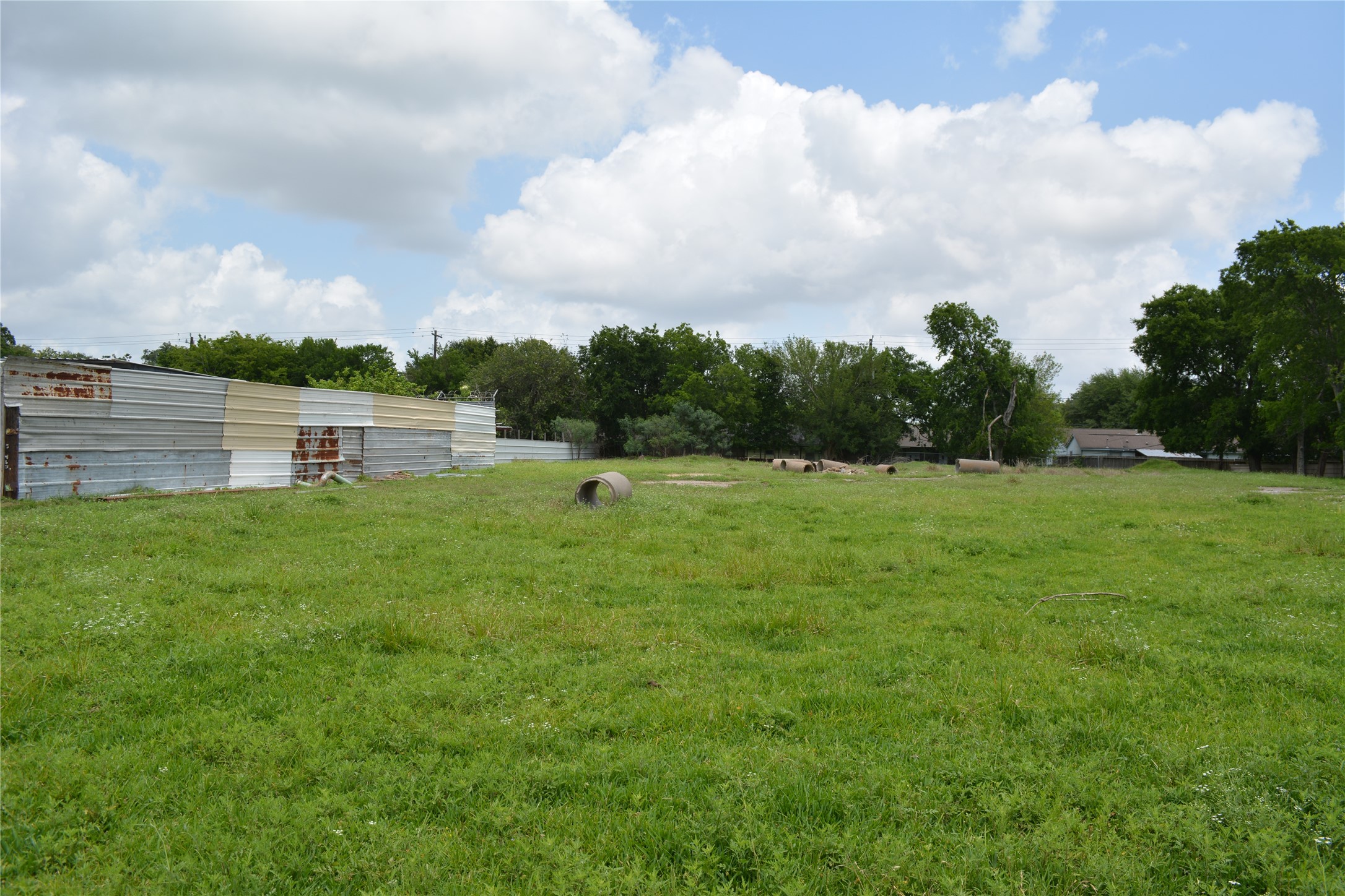 0 Reed Road Houston, TX 77033 - Photo 10 of 24 a view of outdoor space with green field and bench
