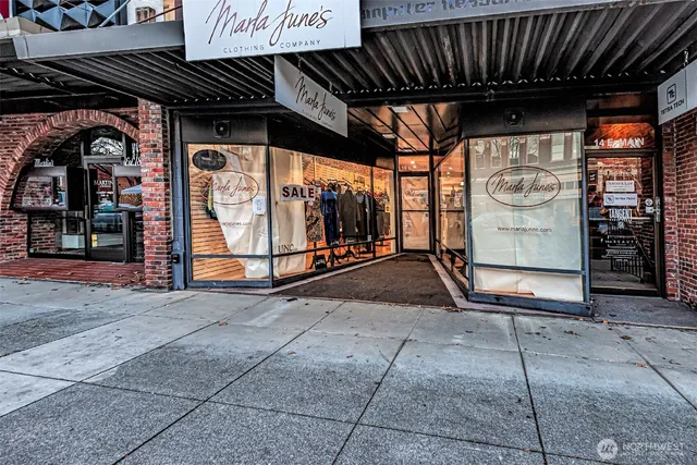 a view of a street with an outdoor space