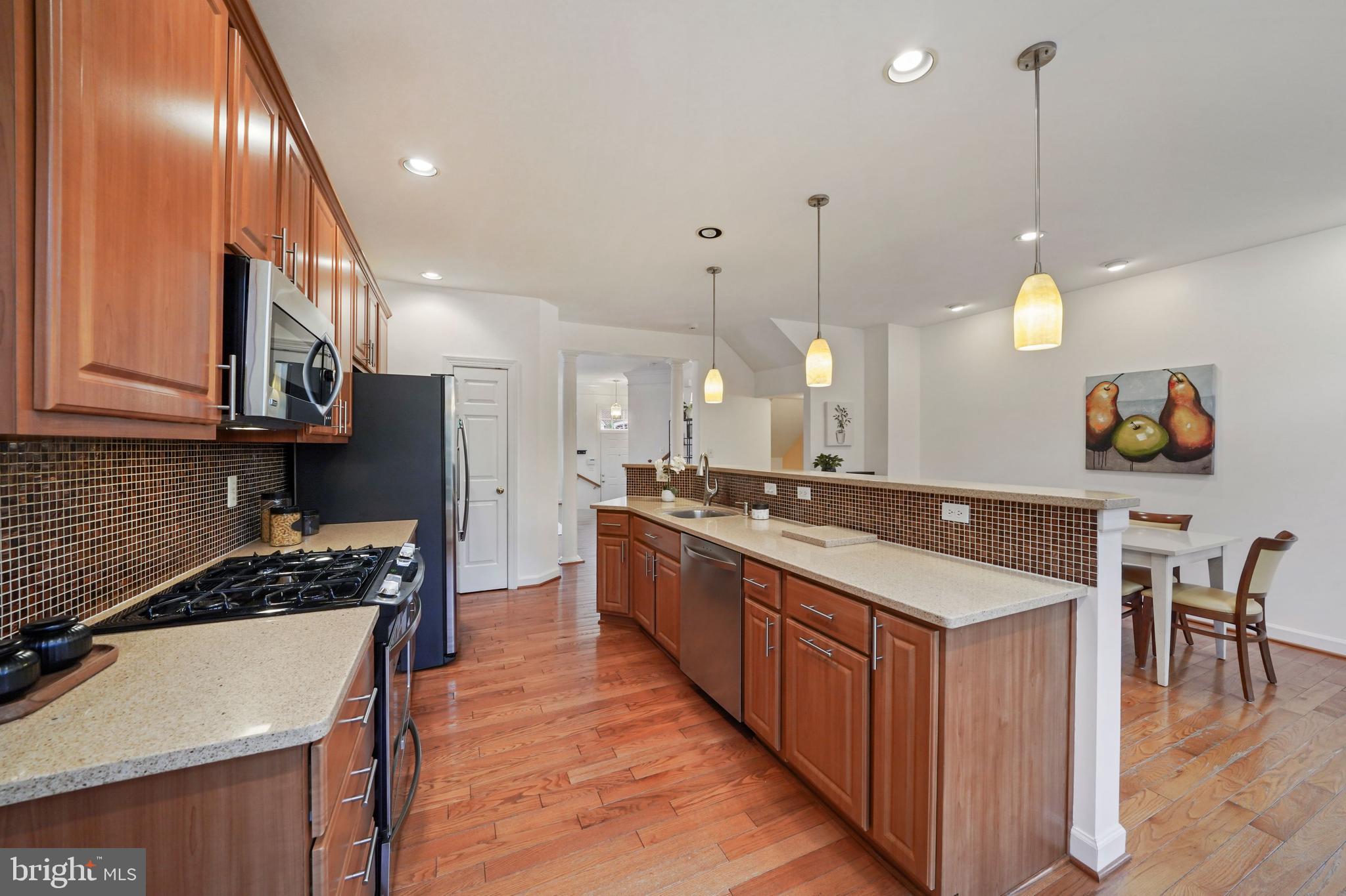 6660 Debra Lu Way Springfield, VA 22150 - Photo 14 of 37 Spacious island with quartz counters & pendants