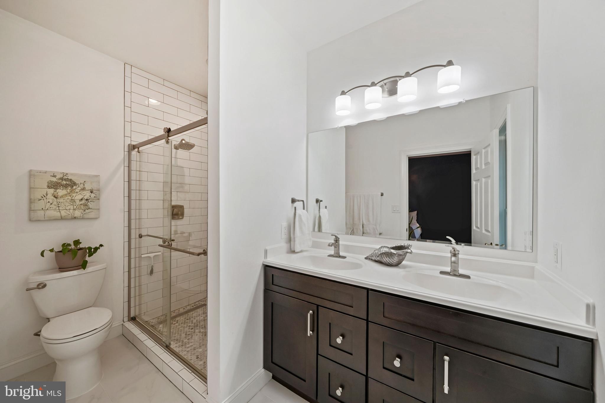6660 Debra Lu Way Springfield, VA 22150 - Photo 22 of 37 Updated primary bath,dual vanity, oversized shower