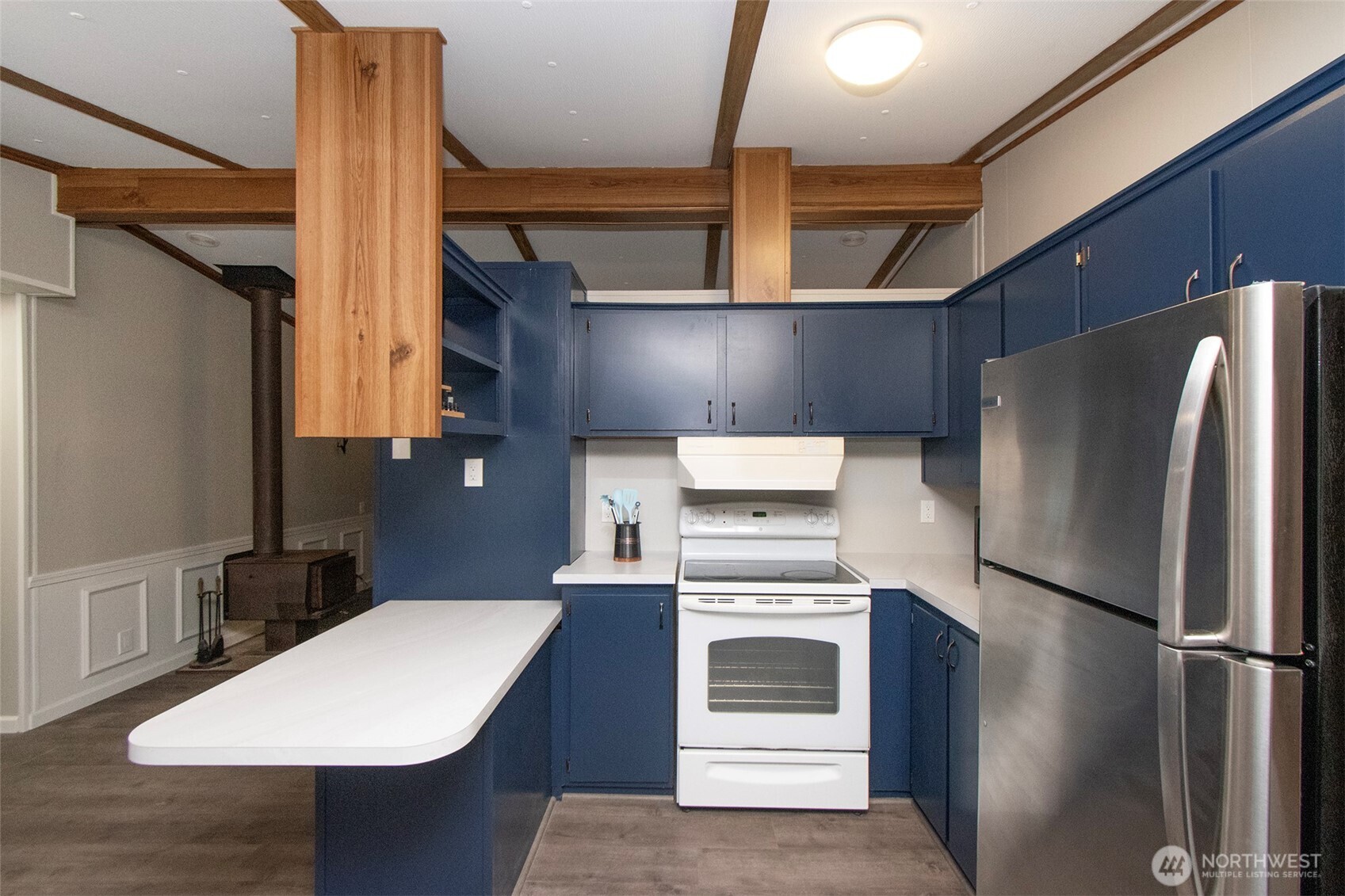 491 Mill Road, Unit 30 Sequim, WA 98382 - Photo 13 of 39 a kitchen with a refrigerator sink and stove
