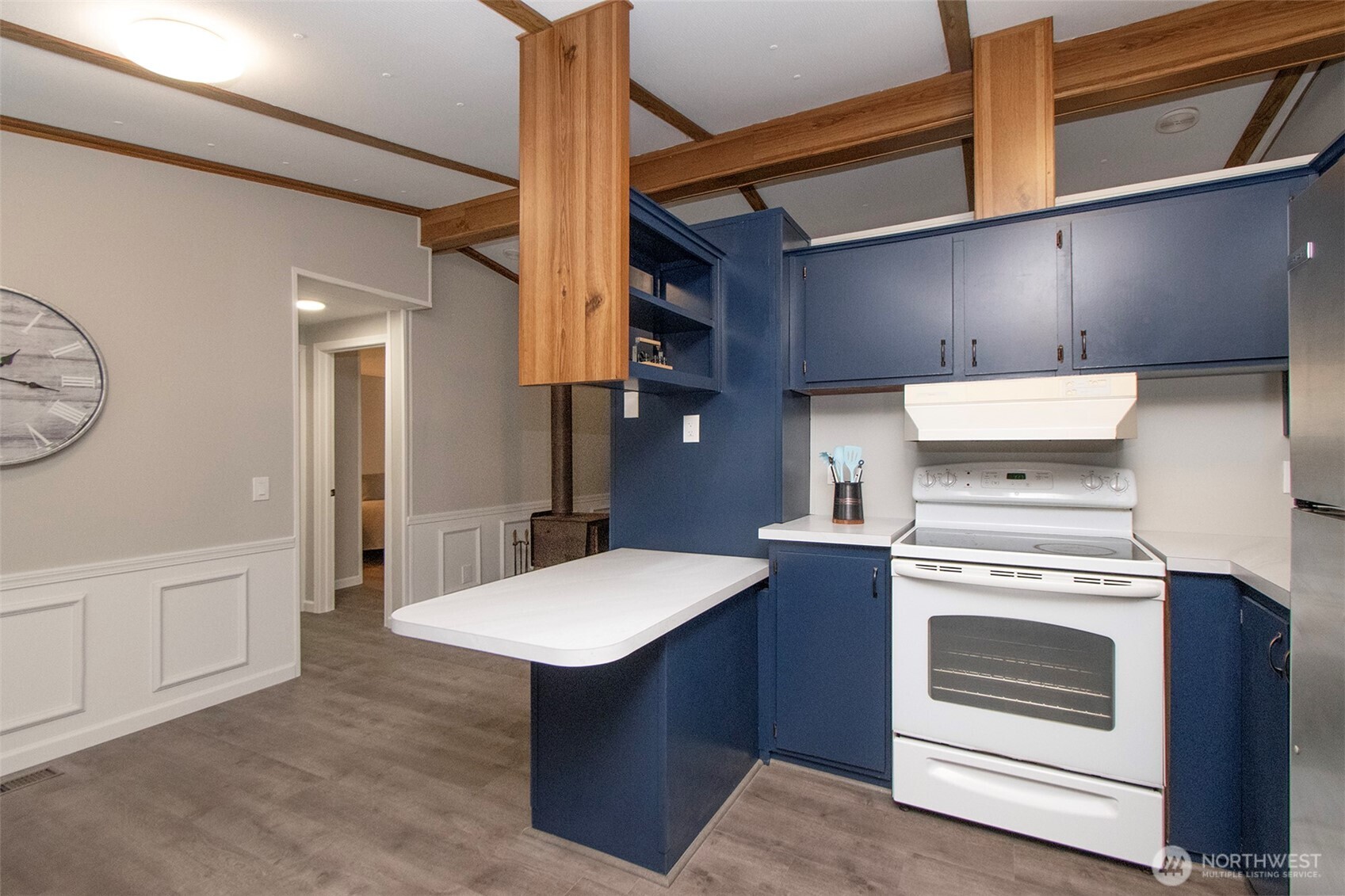 491 Mill Road, Unit 30 Sequim, WA 98382 - Photo 14 of 39 a kitchen with a stove oven and cabinets