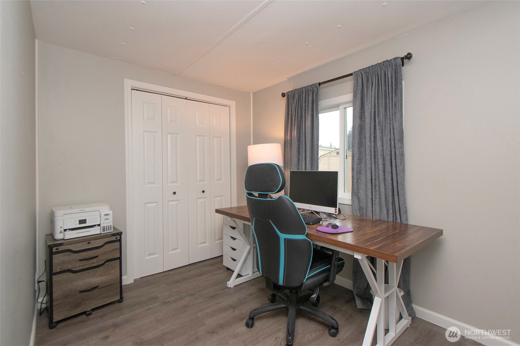 491 Mill Road, Unit 30 Sequim, WA 98382 - Photo 22 of 39 a workspace with furniture and a window