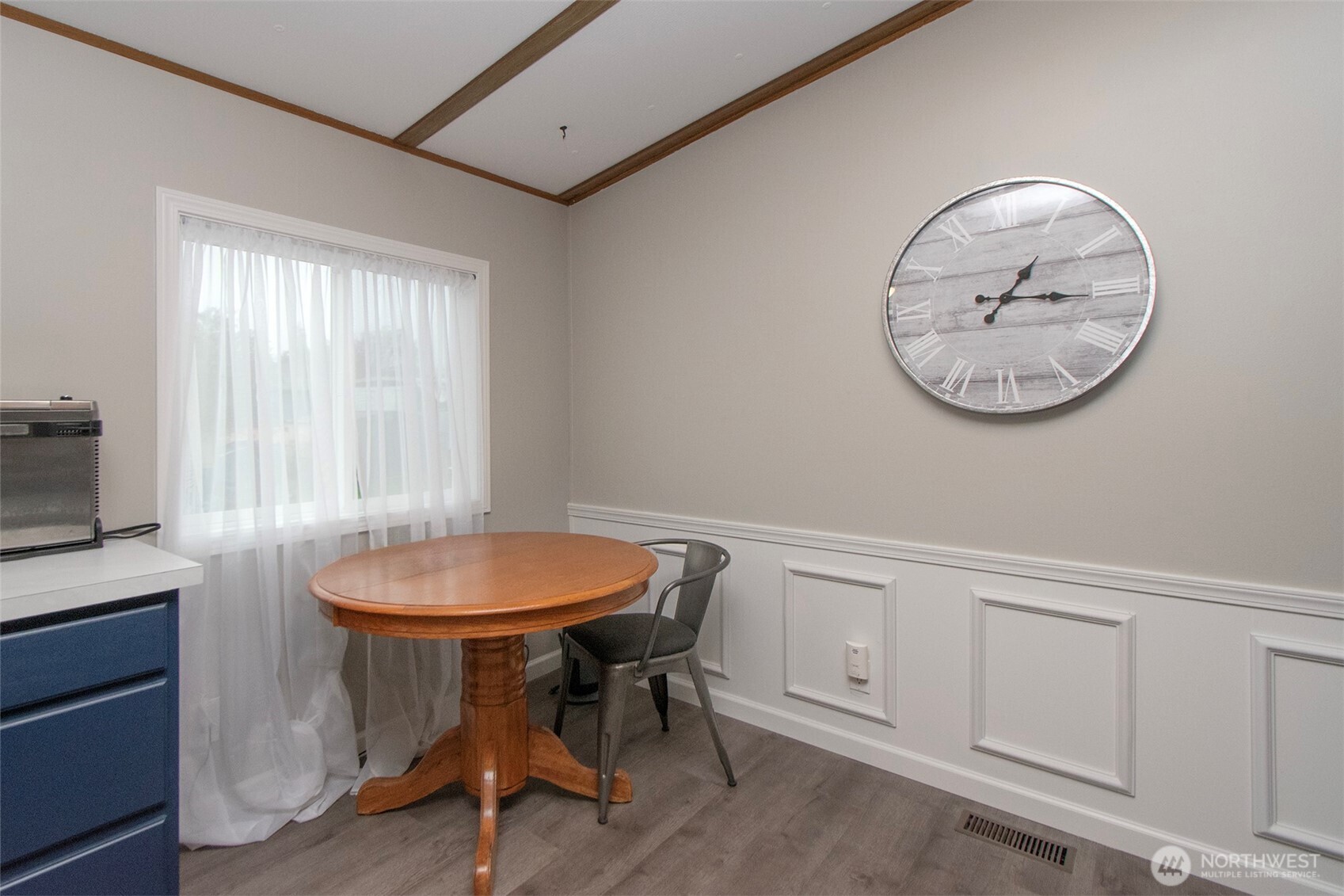491 Mill Road, Unit 30 Sequim, WA 98382 - Photo 10 of 39 a view of a room that has a table and a chair in it