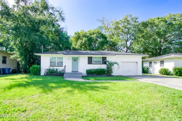 front view of a house and a yard