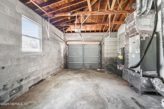 a view of a room with wooden walls