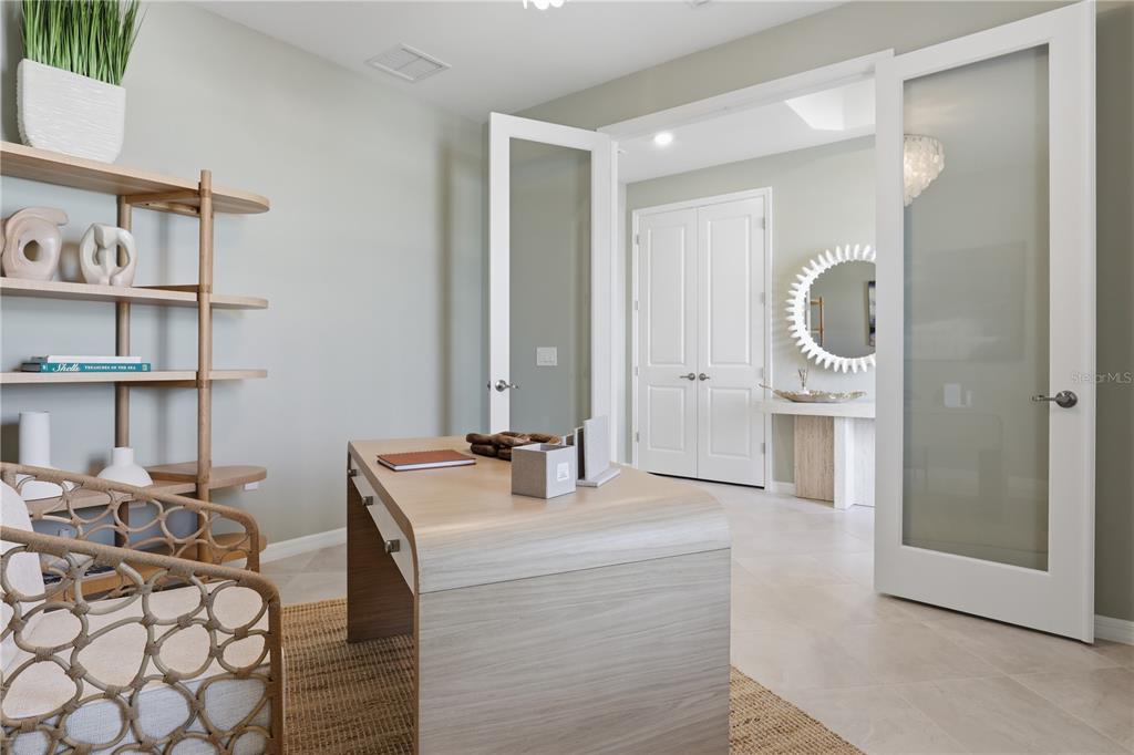 7153 Inlet Isles Lakewood Ranch, FL 34202 - Photo 25 of 26 a bathroom with a double vanity sink mirror and