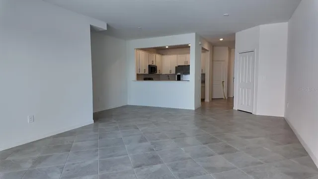 a view of hallway with natural light