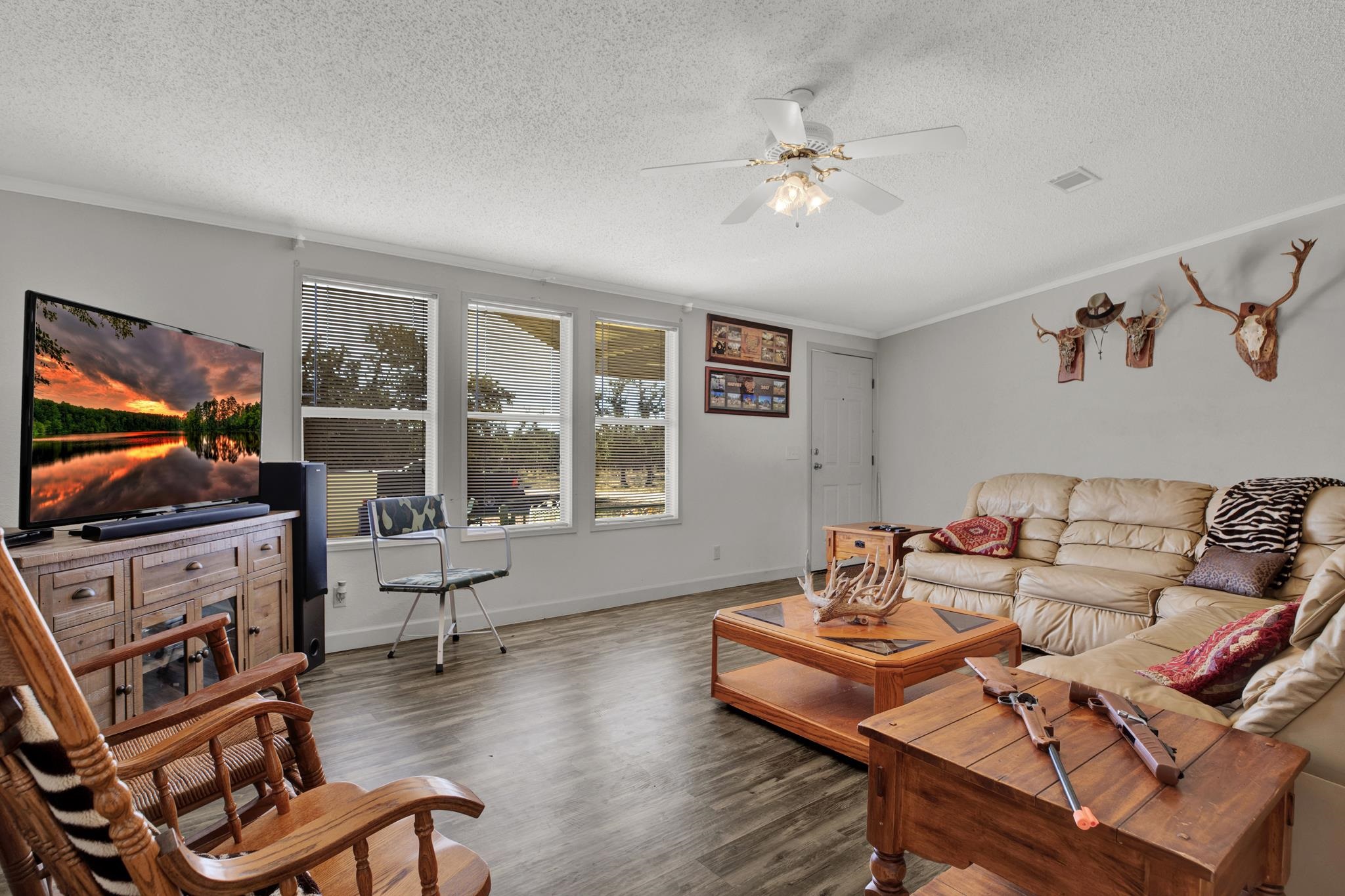 251 Blackjack Ranch Road Harper, TX 78631 - Photo 8 of 16 a living room with furniture and a flat screen tv