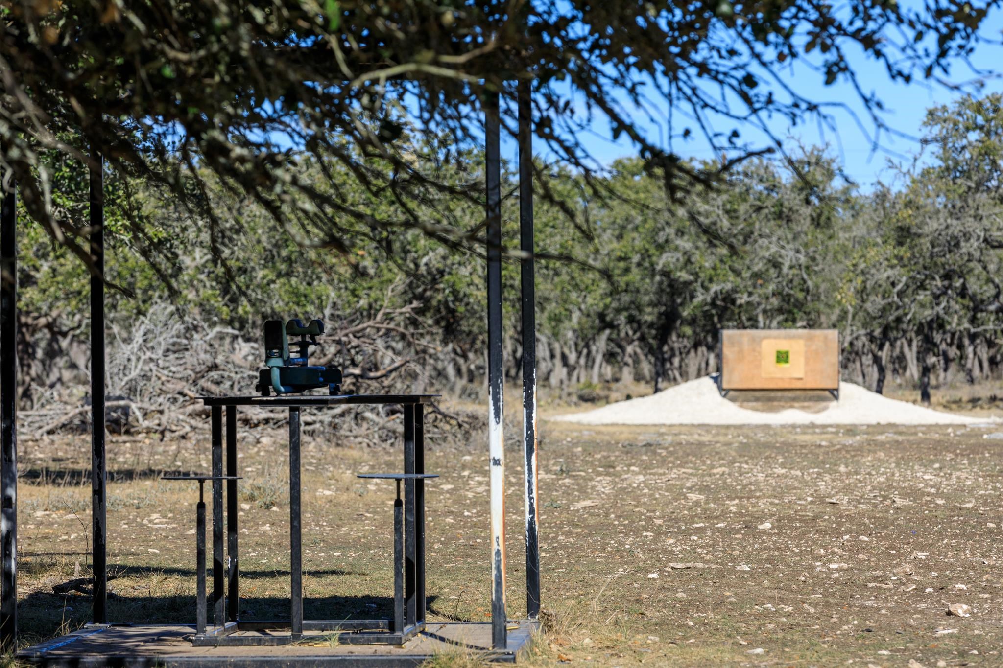 251 Blackjack Ranch Road Harper, TX 78631 - Photo 9 of 16 a street view with tall trees