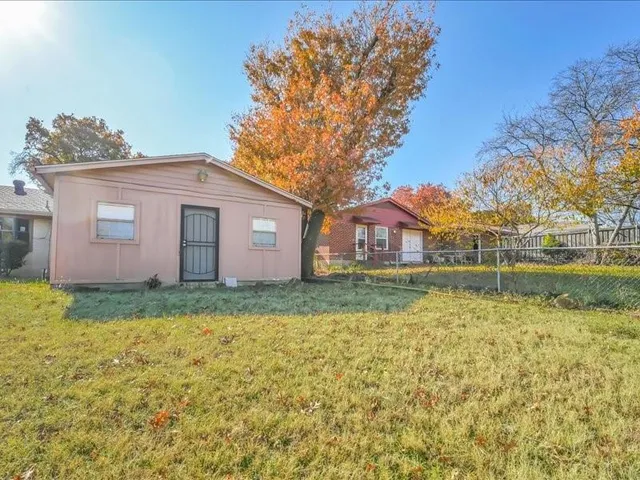 a backyard of a house with lots of green space