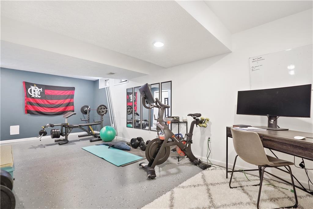 732 Venango Avenue Pittsburgh, PA 15209 - Photo 14 of 25 ...working, exercising or...? Just around the left corner is storage and the mechanicals for the home.