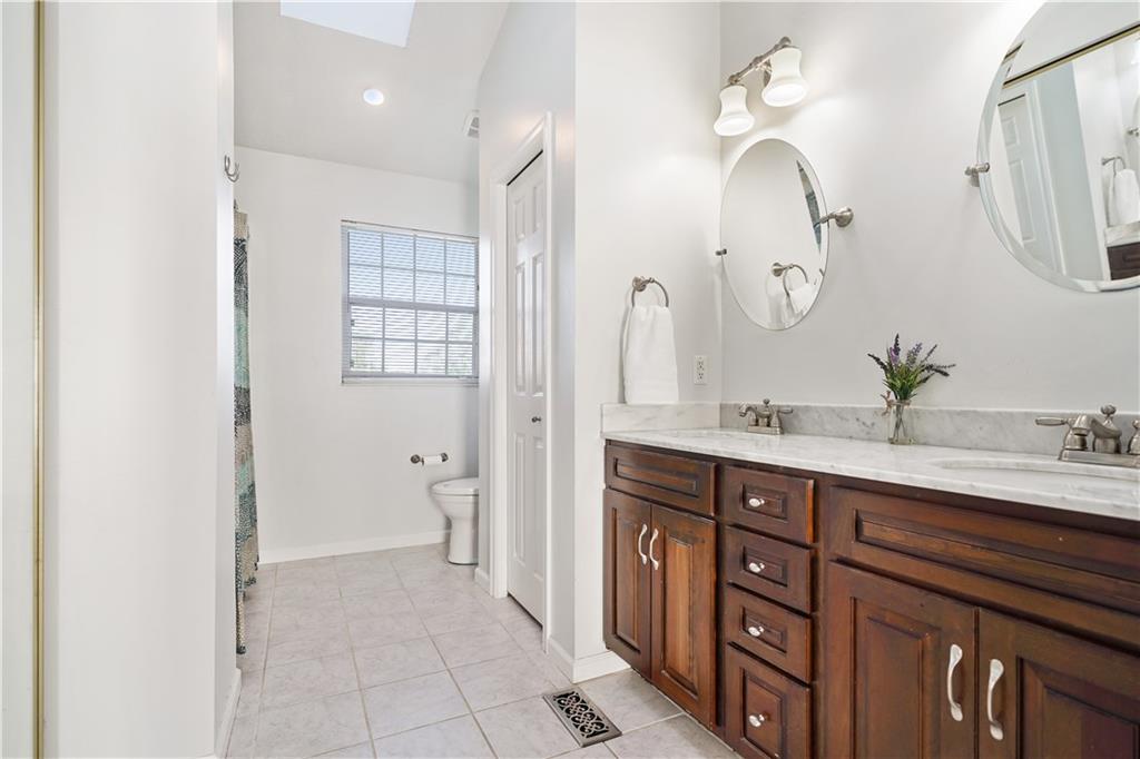 732 Venango Avenue Pittsburgh, PA 15209 - Photo 16 of 25 Oversized, dual sink vanity, and plenty of natural light enhance the master bath.