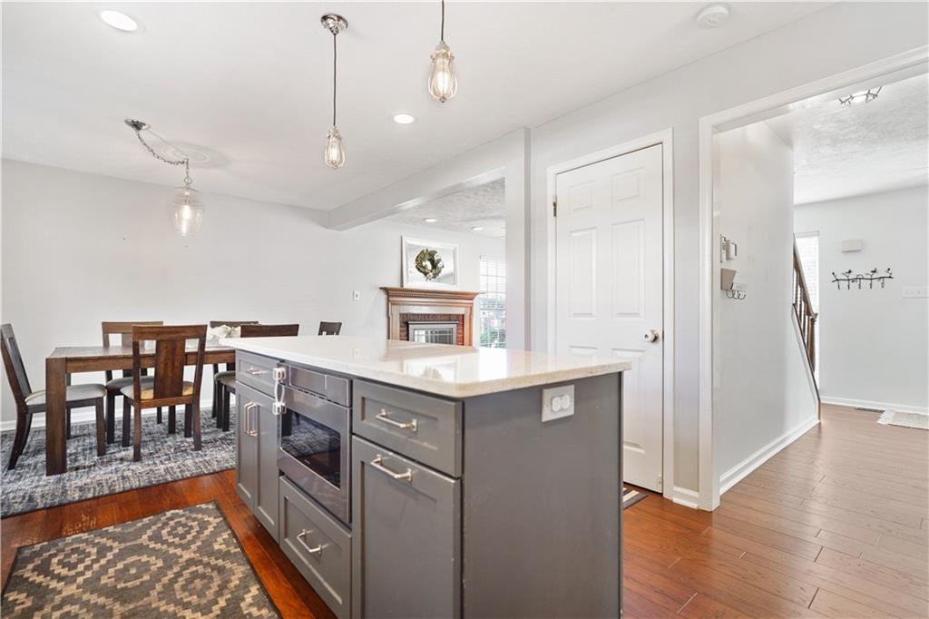 732 Venango Avenue Pittsburgh, PA 15209 - Photo 7 of 25 While you're preparing, the open concept keeps you engaged with guests in the casual dining space, family room and entry. The center door leads downstairs.