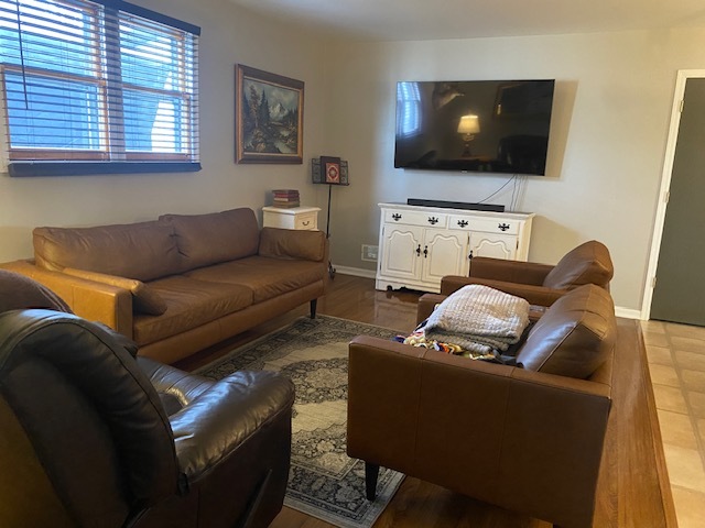 727 15th Street Peru, IL 61354 - Photo 11 of 20 a living room with furniture and a flat screen tv