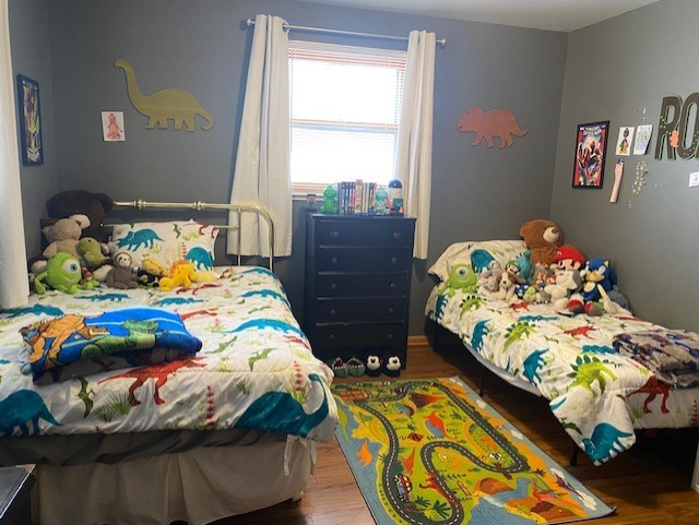 727 15th Street Peru, IL 61354 - Photo 15 of 20 a bedroom with two beds and a window