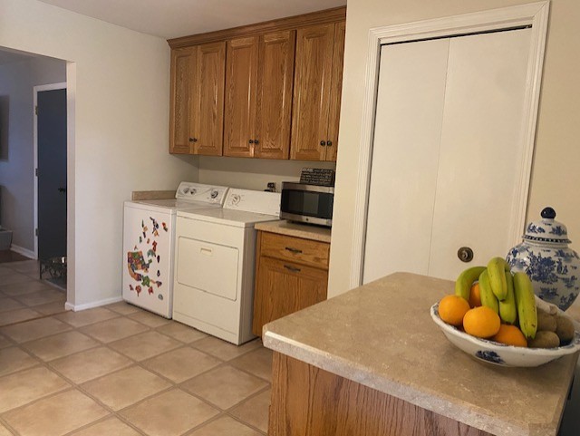 727 15th Street Peru, IL 61354 - Photo 6 of 20 a kitchen with a sink a stove and cabinets