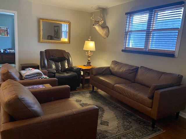 727 15th Street Peru, IL 61354 - Photo 10 of 20 a living room with furniture and a large window