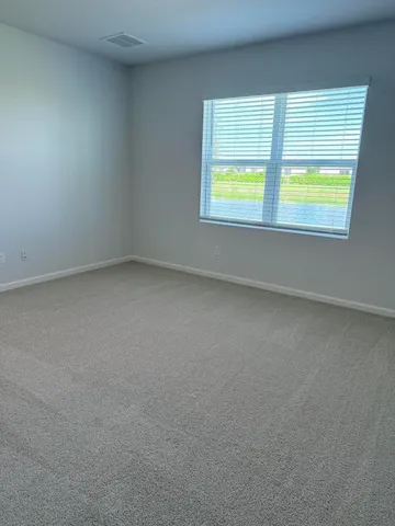 an empty room with window