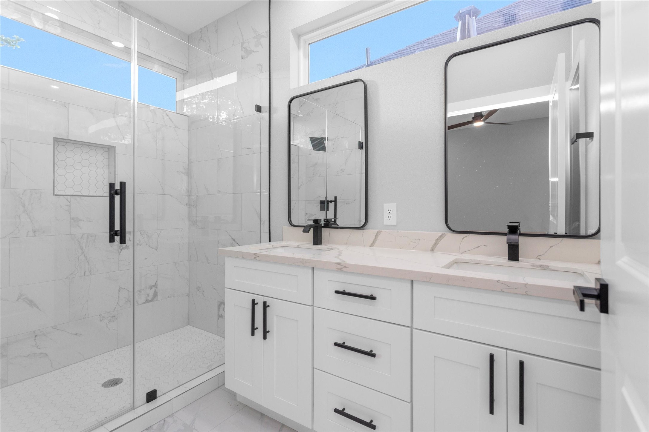 6918 Dumble Street, Unit B Houston, TX 77021 - Photo 2 of 31 a bathroom with a double vanity sink mirror double and shower