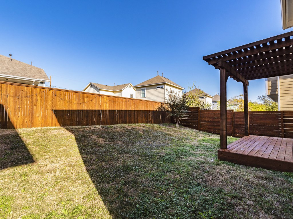 2208 Capulet Street Austin, TX 78741 - Photo 21 of 23 a backyard of a house