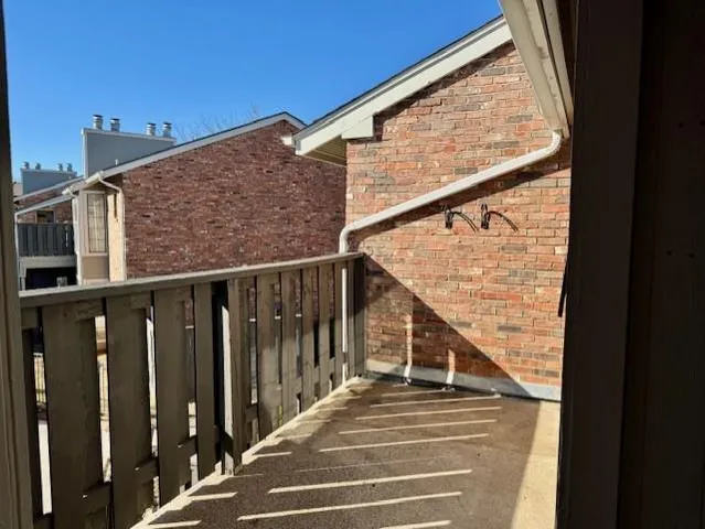a view of balcony with staircase