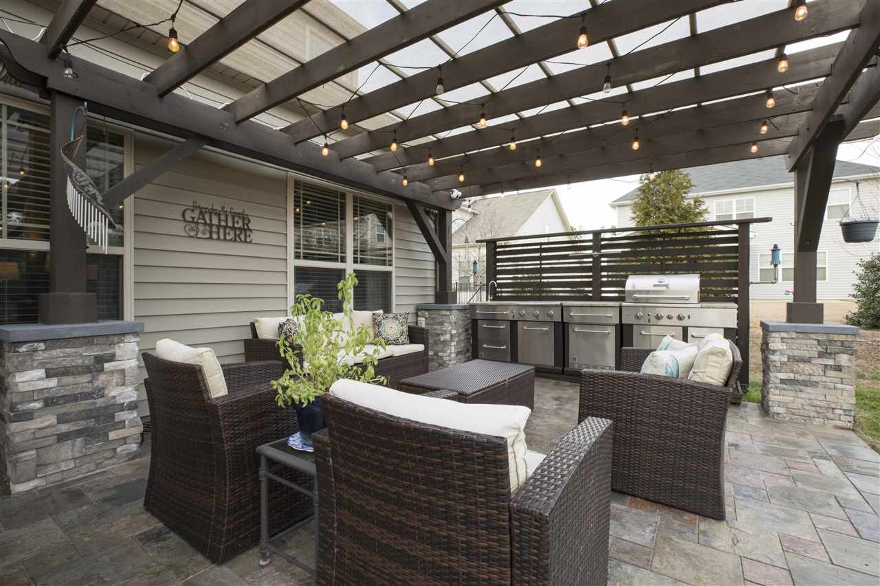 2317 Everstone Road Wake Forest, NC 27587 - Photo 27 of 30 Patio Area with Pergola and Outdoor Kitchen