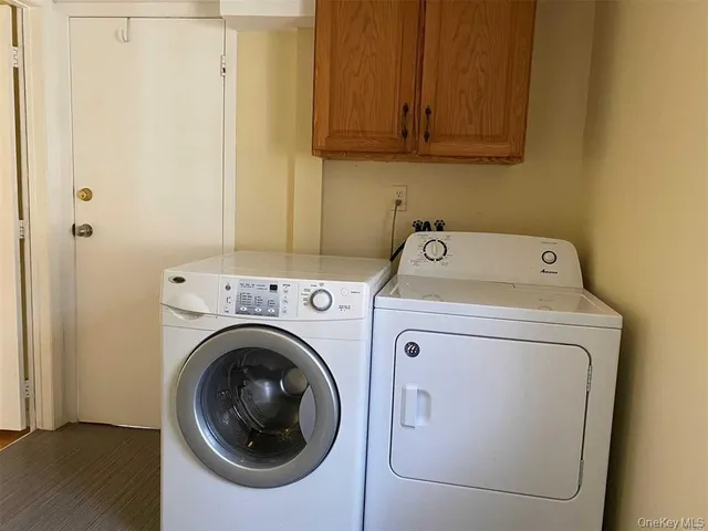 a utility room with dryer and washer