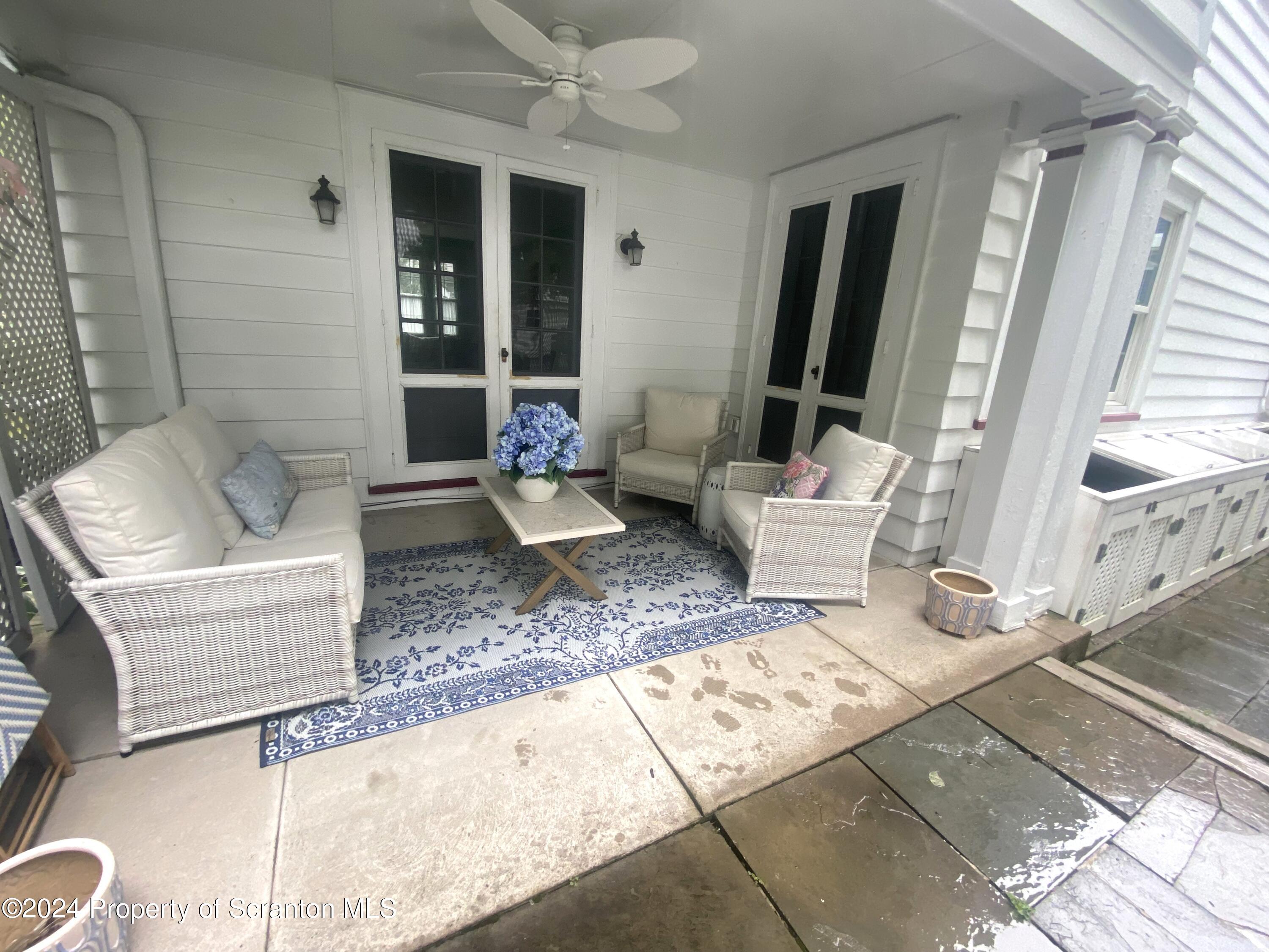 1008 Electric Street Scranton, PA 18509 - Photo 15 of 25 a living room with furniture and a rug