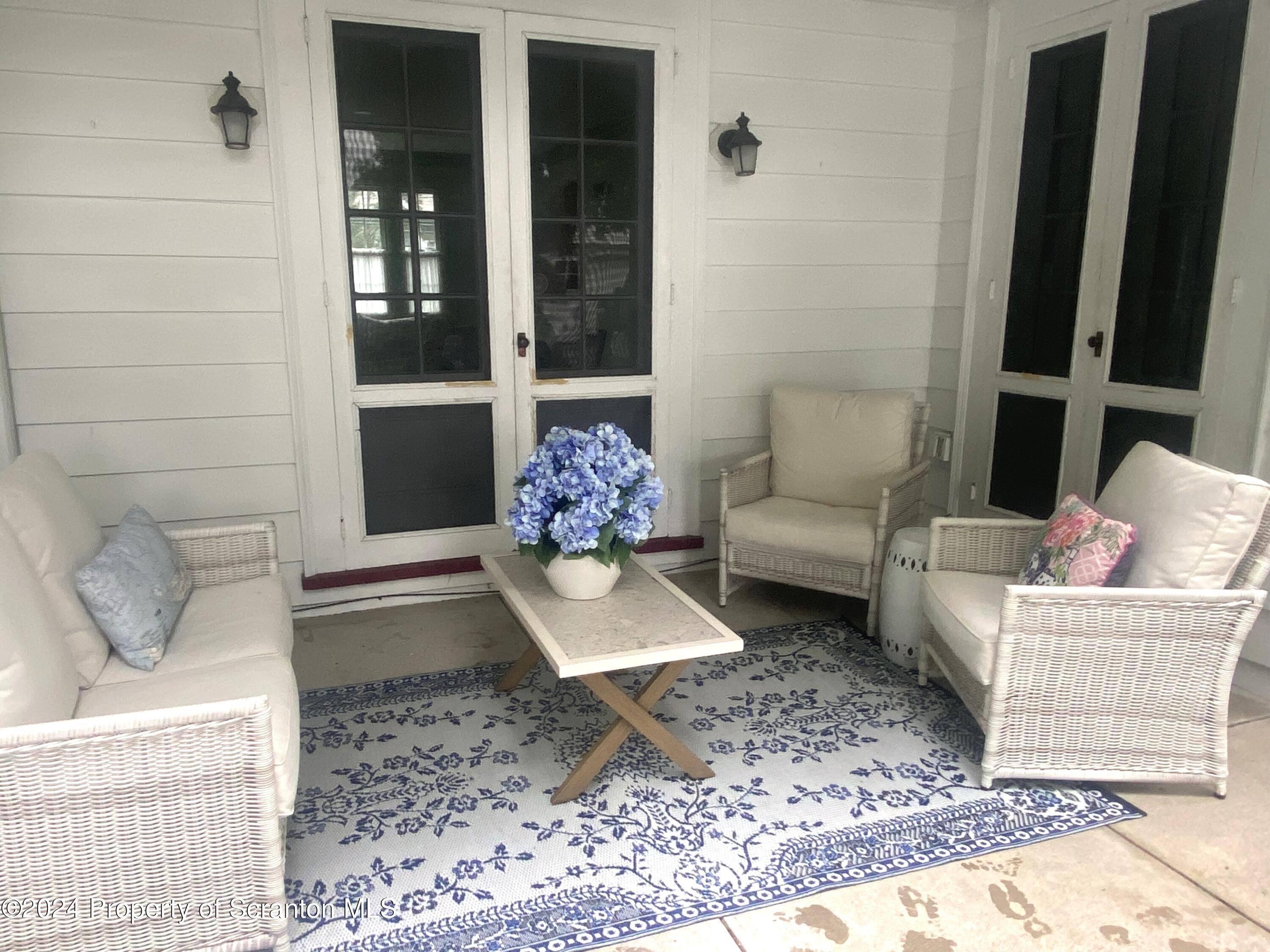 1008 Electric Street Scranton, PA 18509 - Photo 17 of 25 a living room with furniture and a rug
