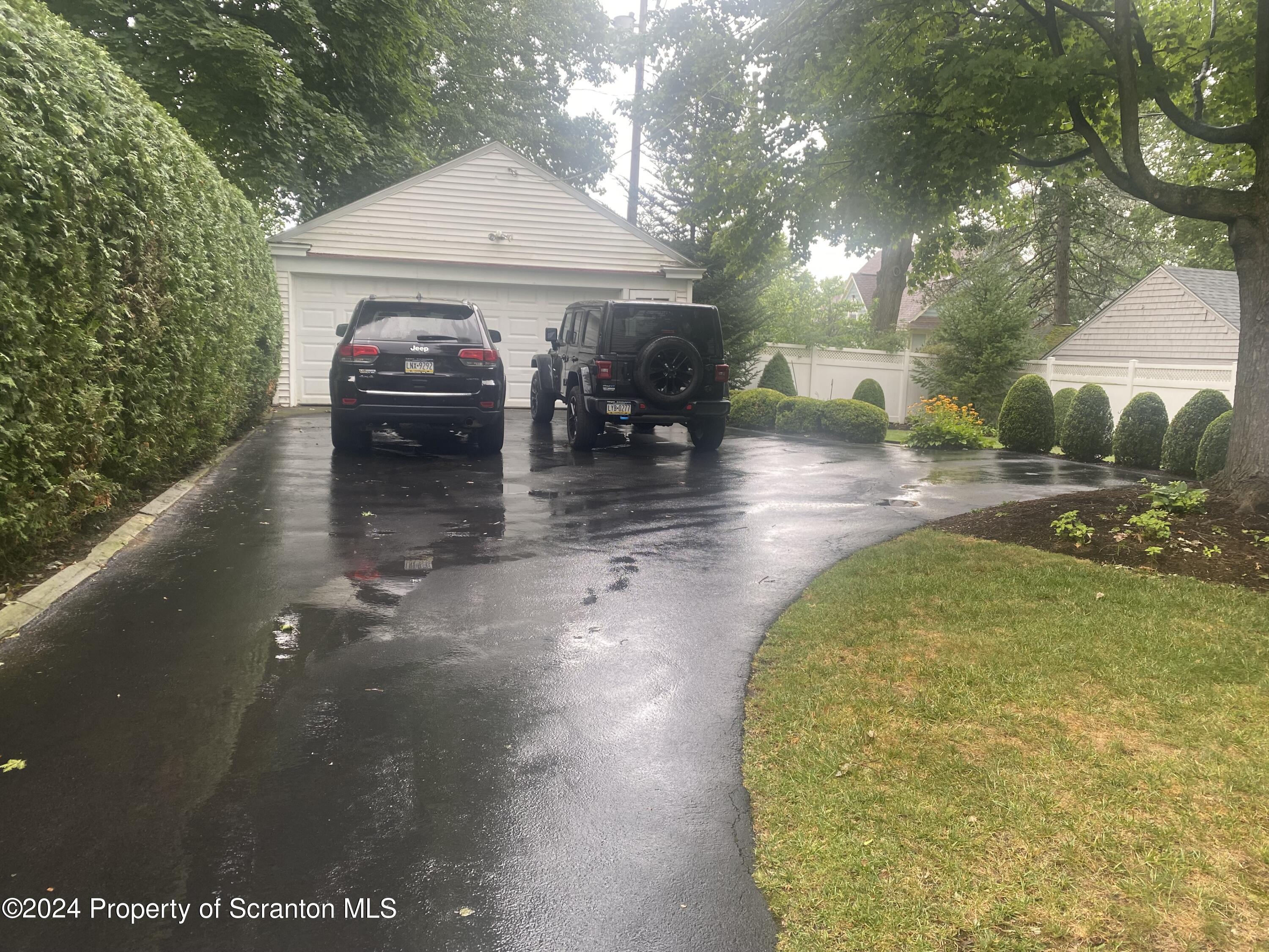 1008 Electric Street Scranton, PA 18509 - Photo 18 of 25 a view of a swimming pool with an outdoor space and seating area