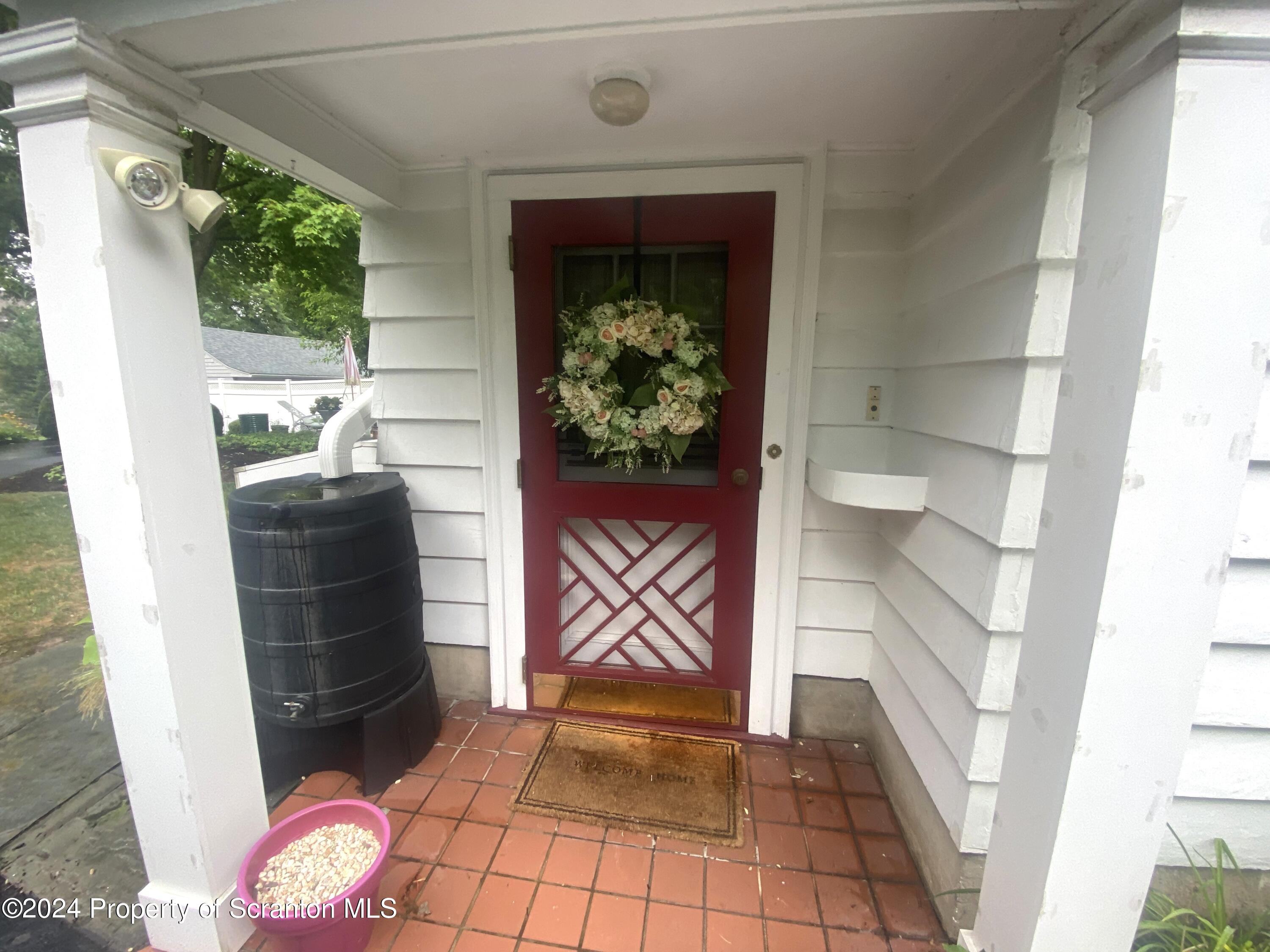1008 Electric Street Scranton, PA 18509 - Photo 19 of 25 a bathroom with a sink and a mirror