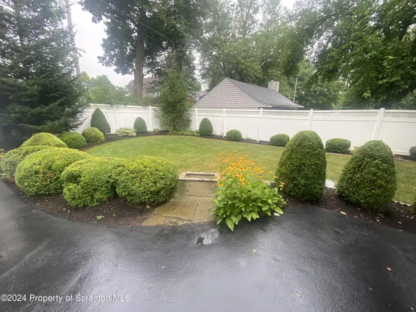 a front view of house with yard